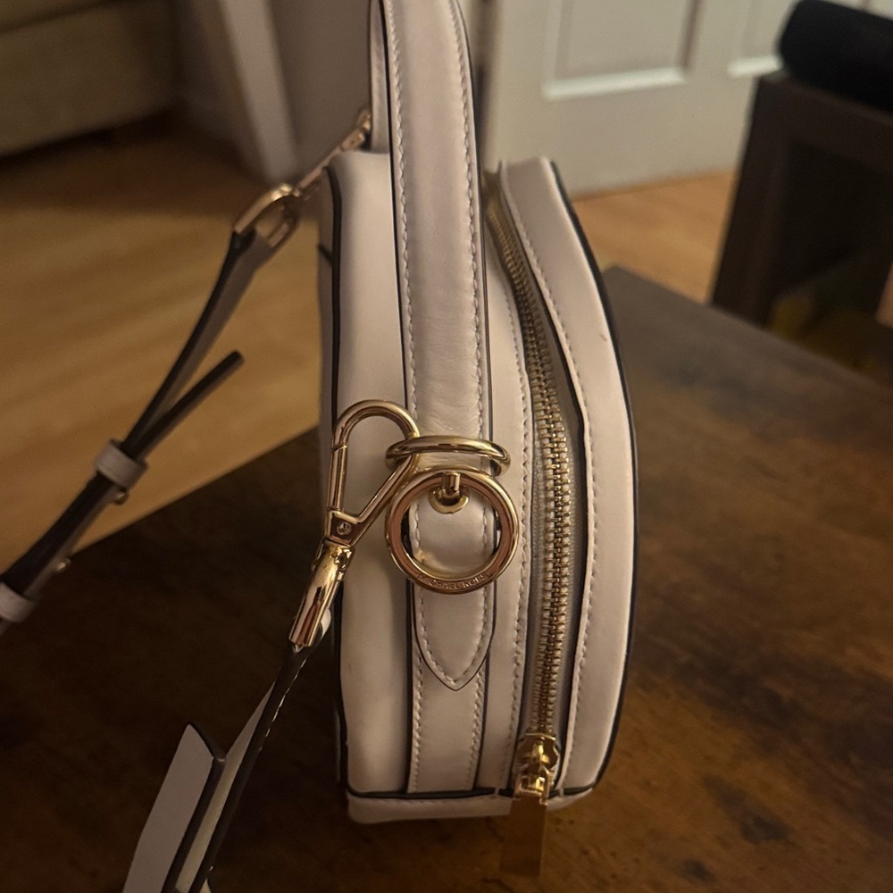 Michael Kors Ivory Round Crossbody Bag with Gold Accents - Picture 3 of 4